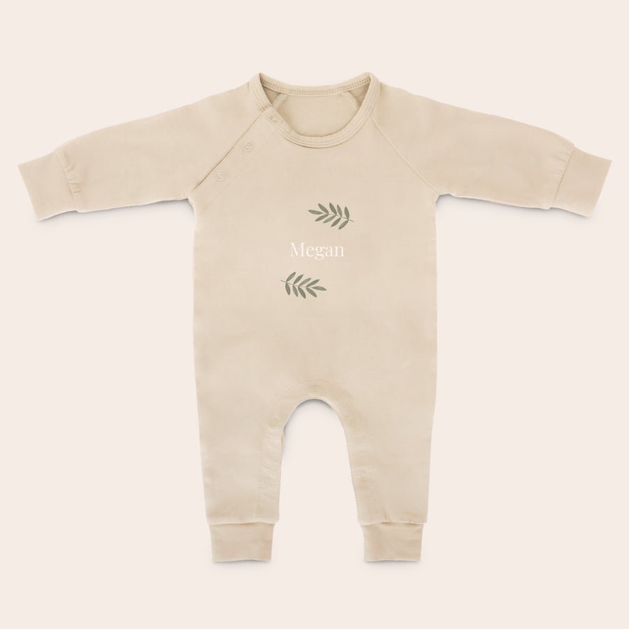 Baby Playsuit - Printed Beige personalized babygrow with Megan name and leaf design, perfect for stretching and kicking those chubby legs.