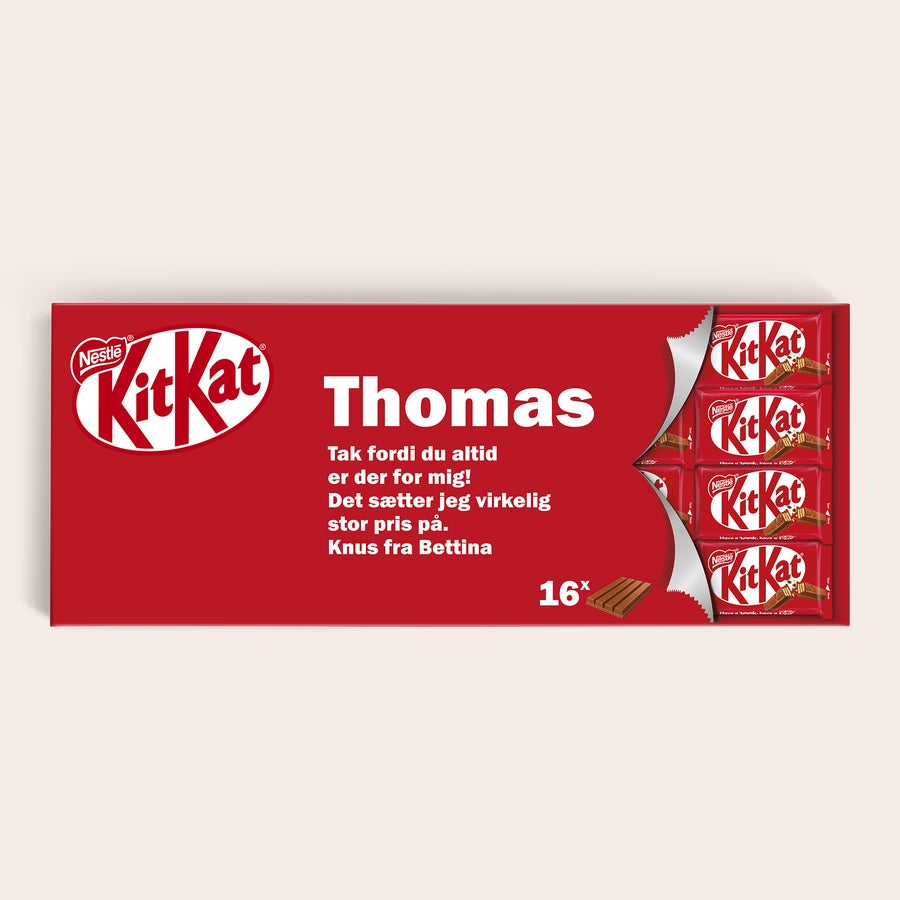 Personlig gigantisk KitKat-chokoladebar Personlig gigantisk KitKat-chokoladebar med navnet Thomas og en hilsen, printet på den røde emballage.