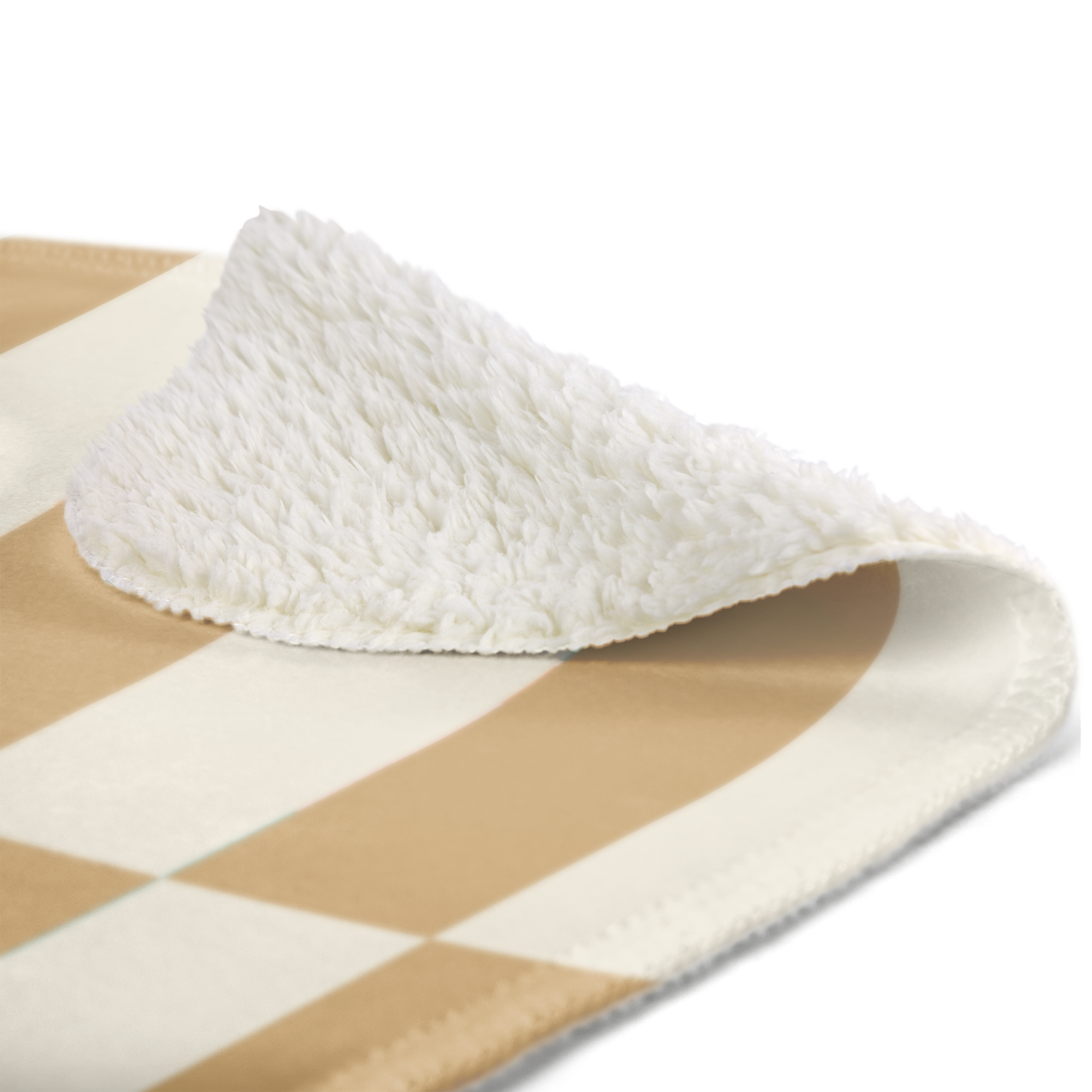 Detail van bedrukte fleecedeken met zachte witte binnenzijde en buitenkant met beige en witte ruiten.