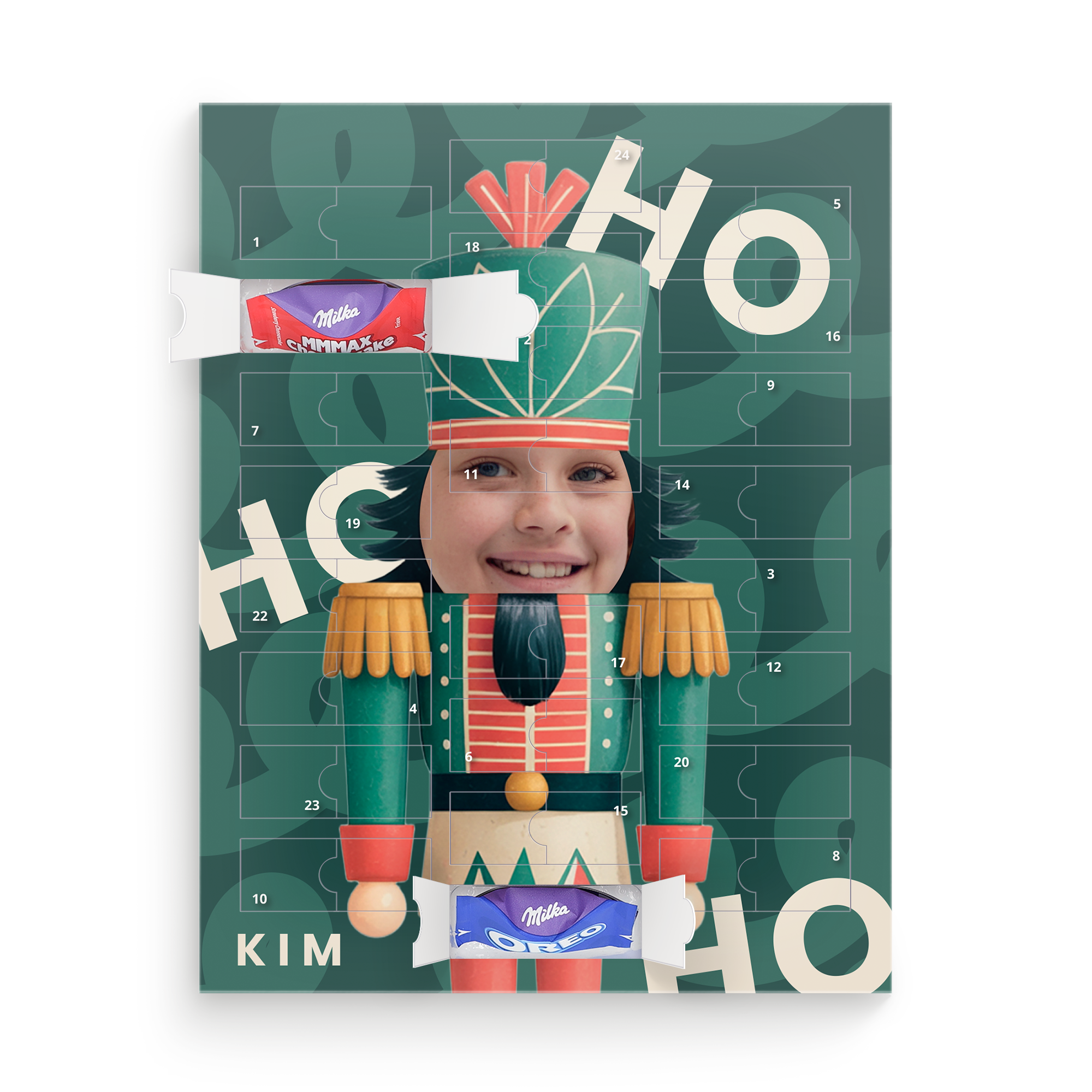 Adventskalender met notenkrakerontwerp, een lachend kindergezicht, de naam Kim en twee geopende Milka chocolaatjes, gepersonaliseerd met foto en naam.