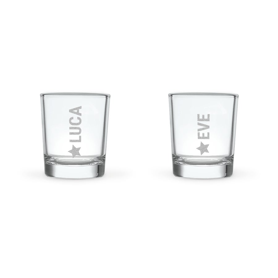 Personalised limoncello - YourSurprise Two personalized shot glasses, one engraved with LUCA and a star, the other with EVE and a star