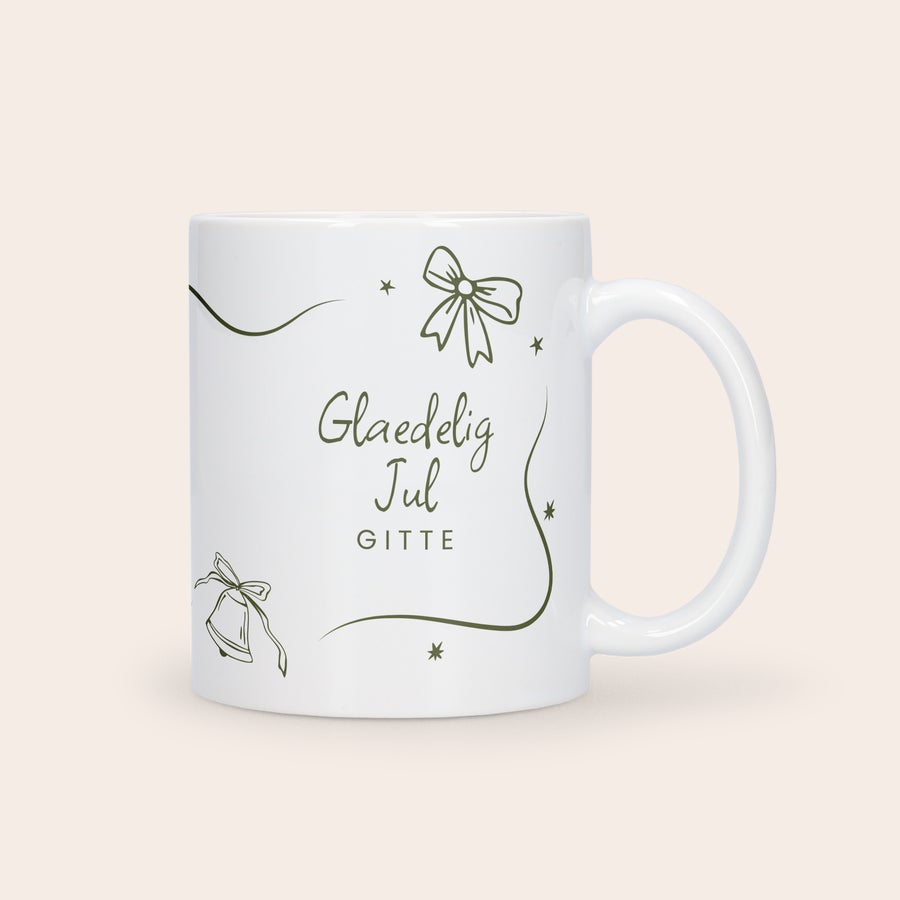 Krus med foto - Hvidt Krus med foto - Hvidt med Grønlandsk tekst Glædelig Jul Gitte, en sløjfe og klokker, personliggjort til julegaven.