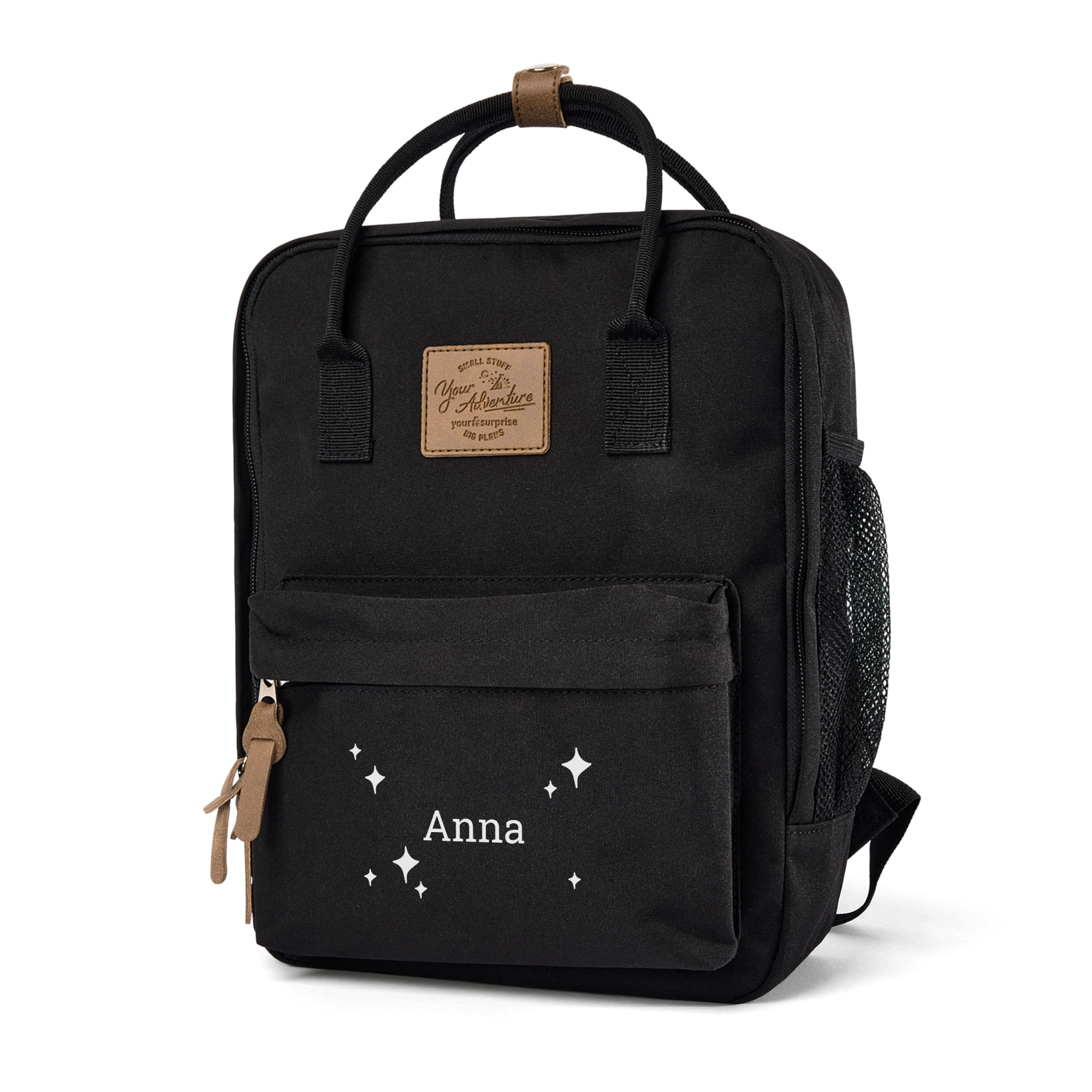 Rucsac negru pentru copii, personalizat cu numele Anna și steluțe albe, imprimat pe buzunarul frontal.