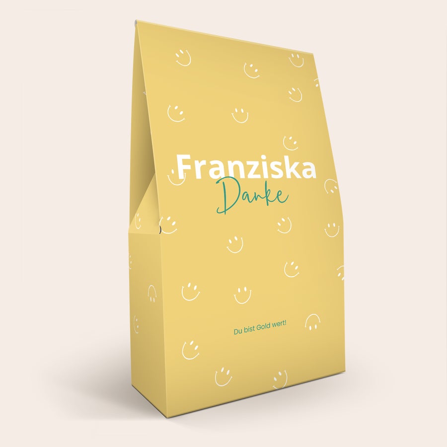 Lindt 1kg Schokolade Geschenkbox Lindor Geschenkbox mit Foto Namen und Text Franziska Danke Du bist Gold wert auf gelbem Hintergrund