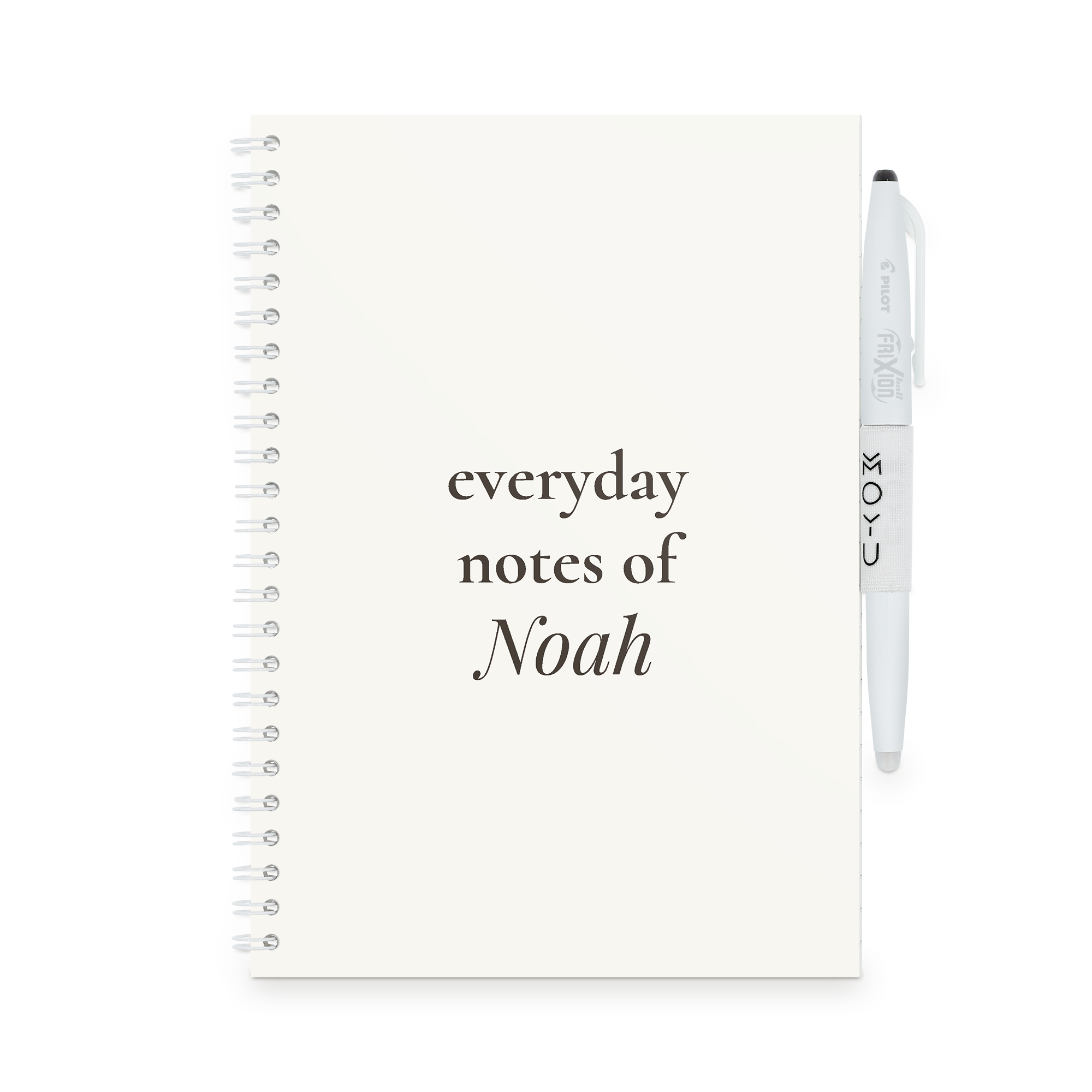 White personalised MOYU erasable notebook with the text 'everyday notes of Noah' printed on the cover, featuring a Frixion pen in a pen loop.