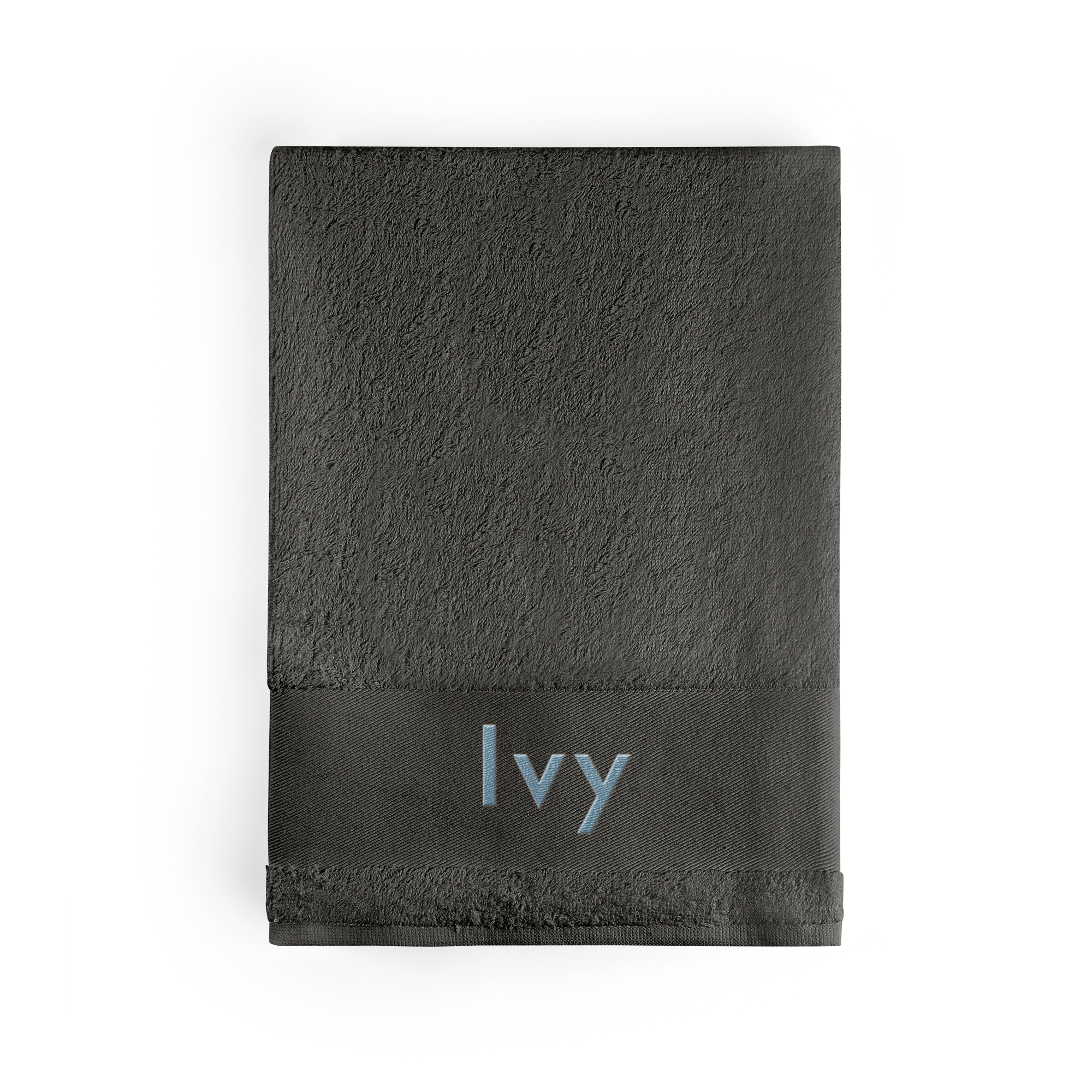 Dark gray towel embroidered with the name Ivy in light blue, a super soft and cuddly personalized towel