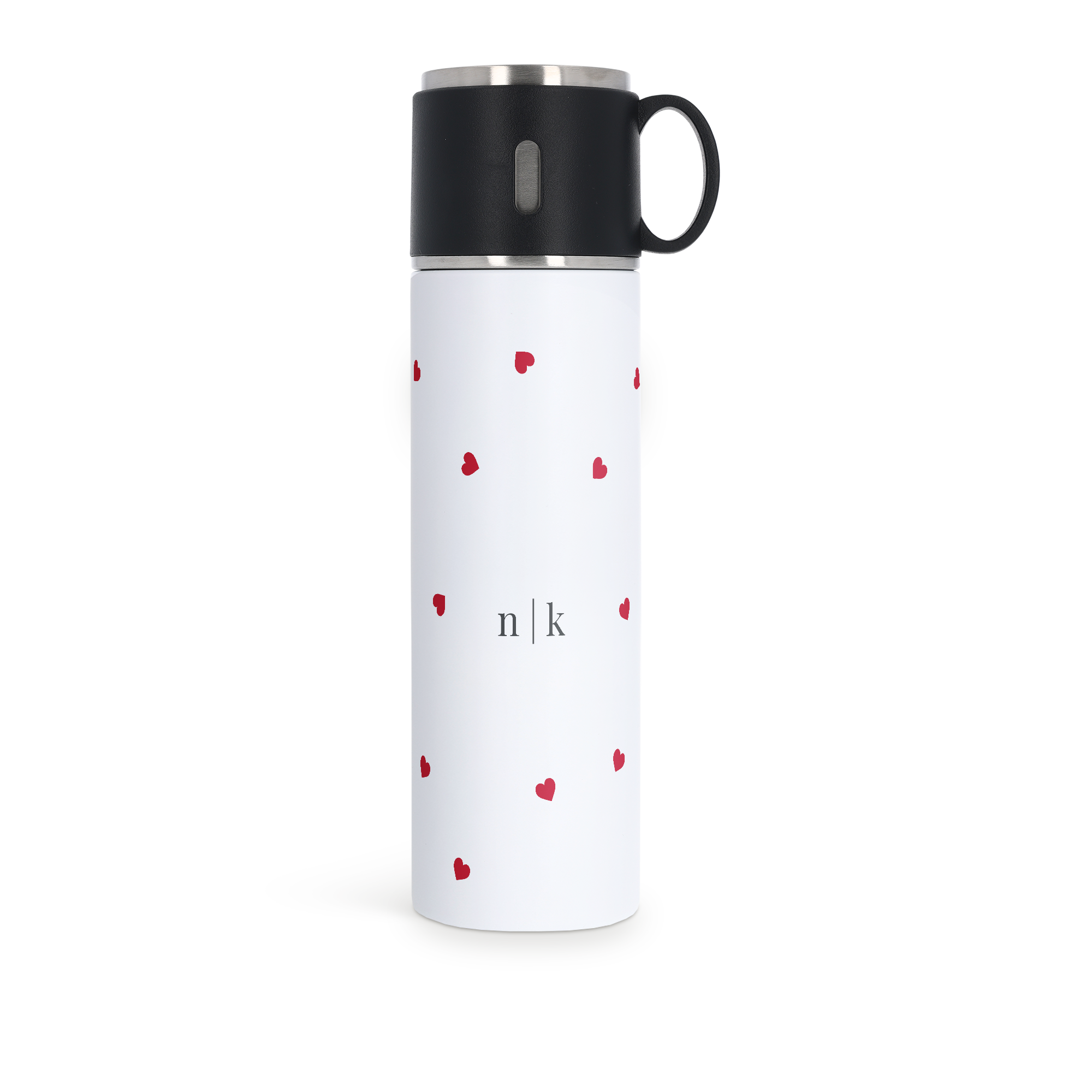 White 500ml personalised flask with cup, printed with small red hearts and the initials n|k. Capture unforgettable moments.