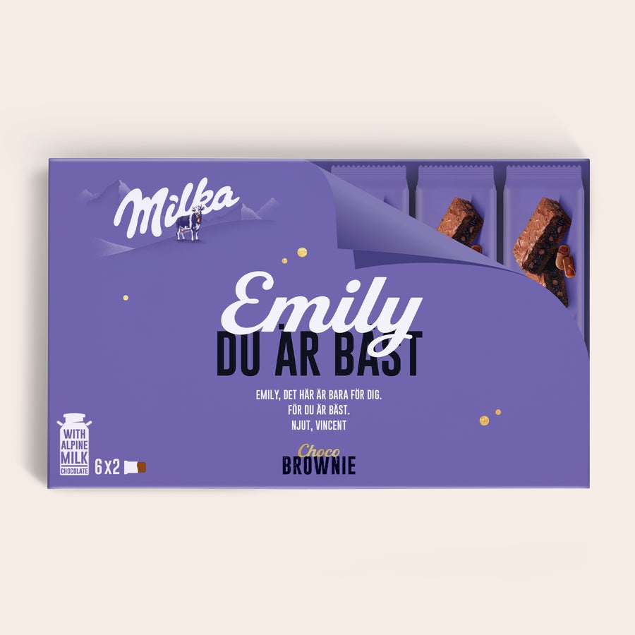 Milka Brownies Personlig presentförpackning Milka Choco Brownie med namnet Emily, tryckt med texten "DU ÄR BÄST" och ett meddelande.