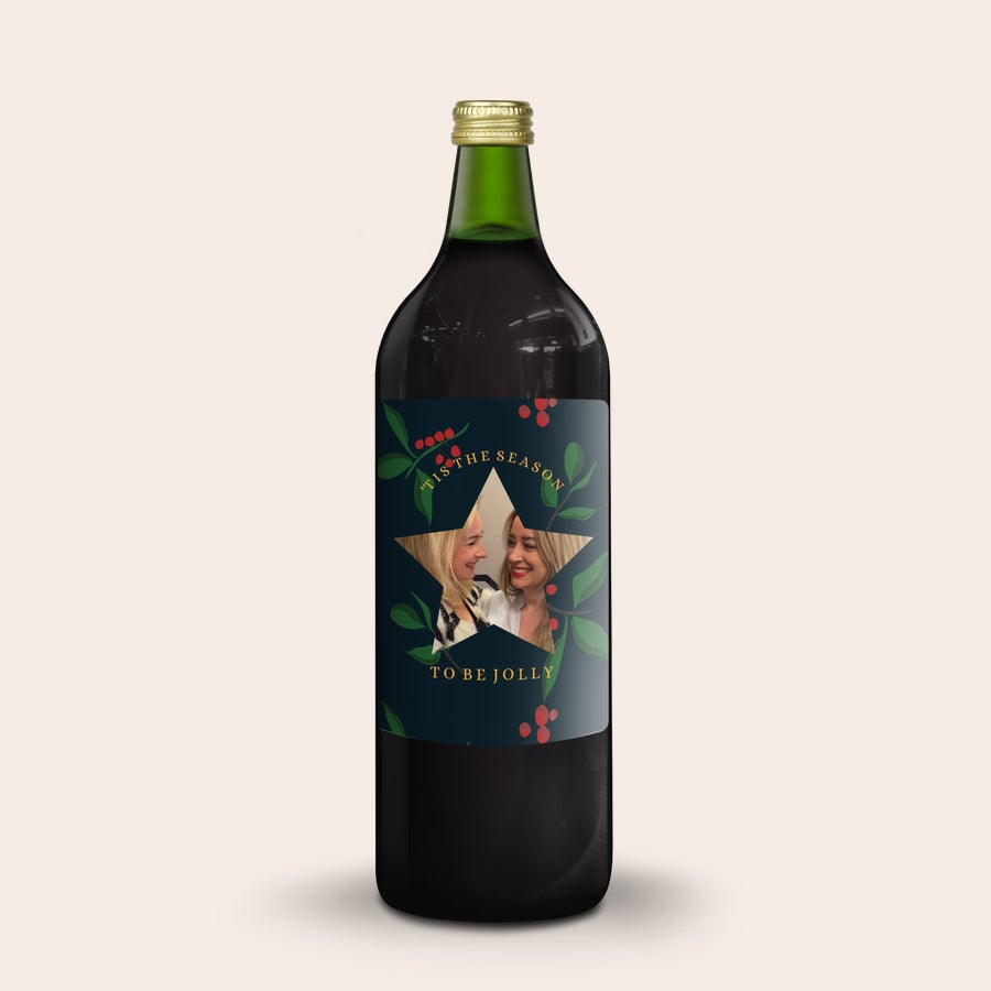 Gluhwein Engelsglut Botella de glühwein personalizada con foto de dos mujeres sonriendo en una etiqueta con diseño de estrella y texto Tis the season to be jolly