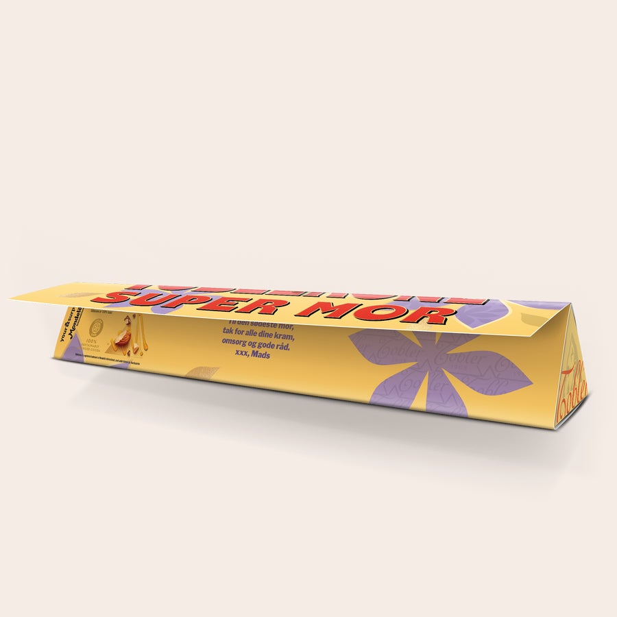 Toblerone med navn - Mors Dag Personlig Toblerone-chokoladebar med teksten "SUPER MOR" og en besked trykt på indpakningen for at overraske din mor.