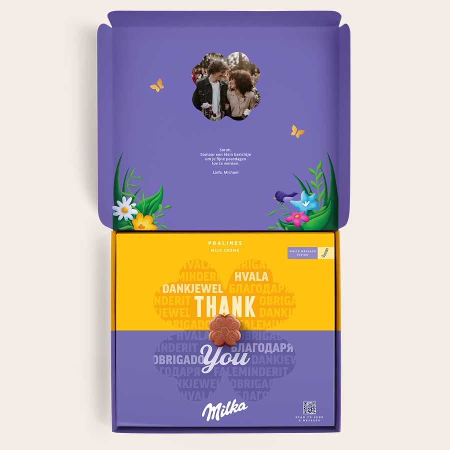 Milka Pralinky Velikonoce Personalizovaná dárková krabička Řekni to s Milka, s fotografií a vzkazem uvnitř, se čokoládovými pralinkami.