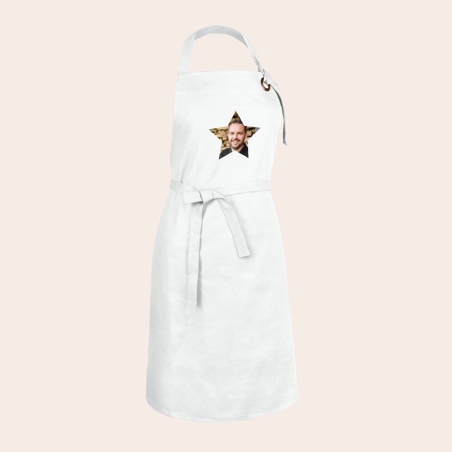 Apron White kitchen apron printed with a photo of a smiling man inside a star frame. Design your own unique kitchen apron.