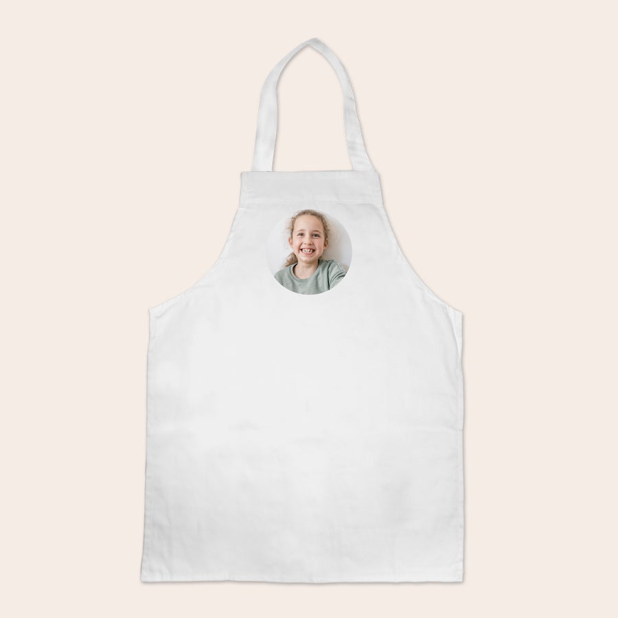 Grembiule per bambini Grembiule per bambini bianco con foto stampata di una bambina sorridente, personalizzabile con nome o testo