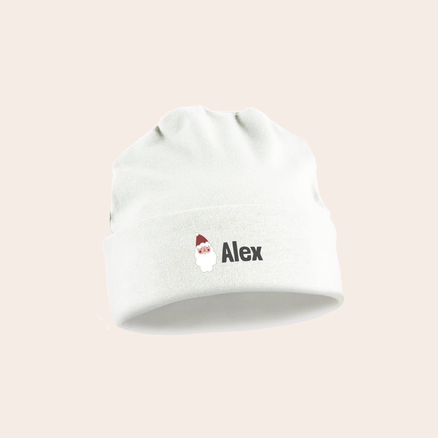 Gorro de bebê personalizado - Primeiro Natal - Branco Gorro de bebê branco estampado com rosto de Papai Noel e nome Alex para o primeiro Natal