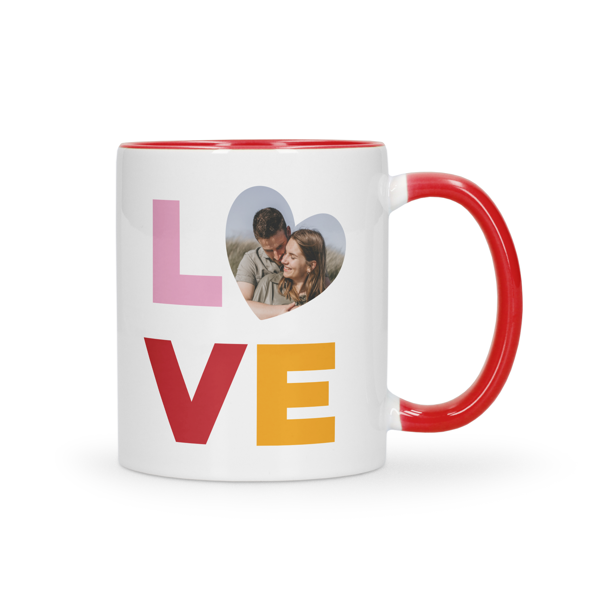 A white and red coloured mug with the word LOVE printed on it. The O in LOVE is a heart-shaped photo of a couple.