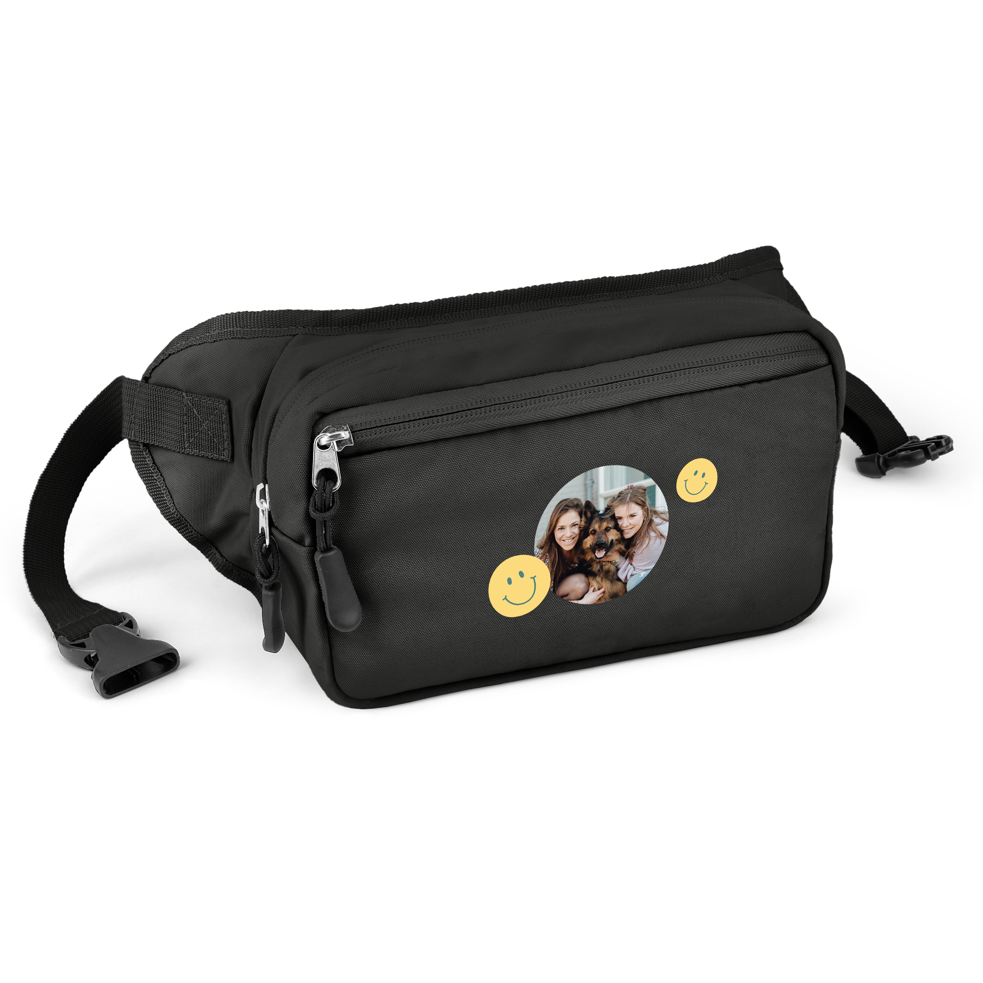 Schwarze Bauchtasche mit Reißverschlussfächern, bedruckt mit einem persönlichen Foto von zwei Personen und einem Hund, umgeben von zwei gelben Smileys.