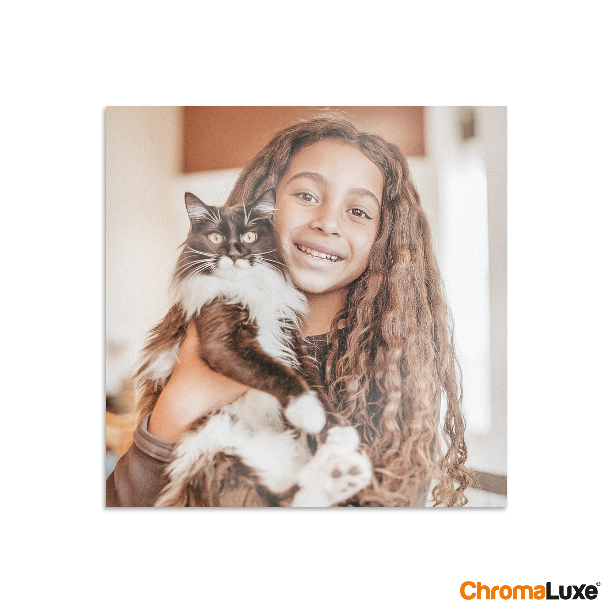 Custom Chromaluxe aluminium photo print of a smiling girl holding a black and white cat, capturing favorite memories