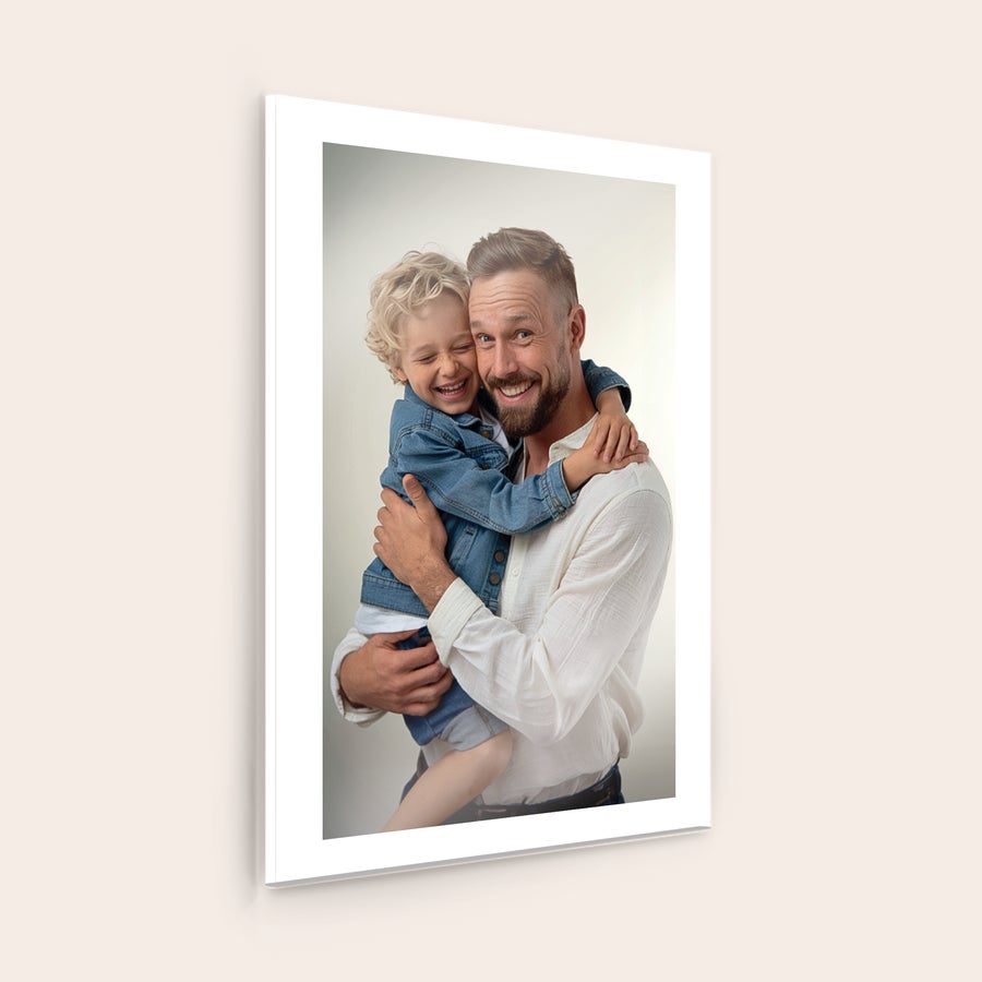 Photo on Acrylic Personalized photo on acrylic featuring a man holding a smiling boy in his arms, printed on a clear, glossy surface