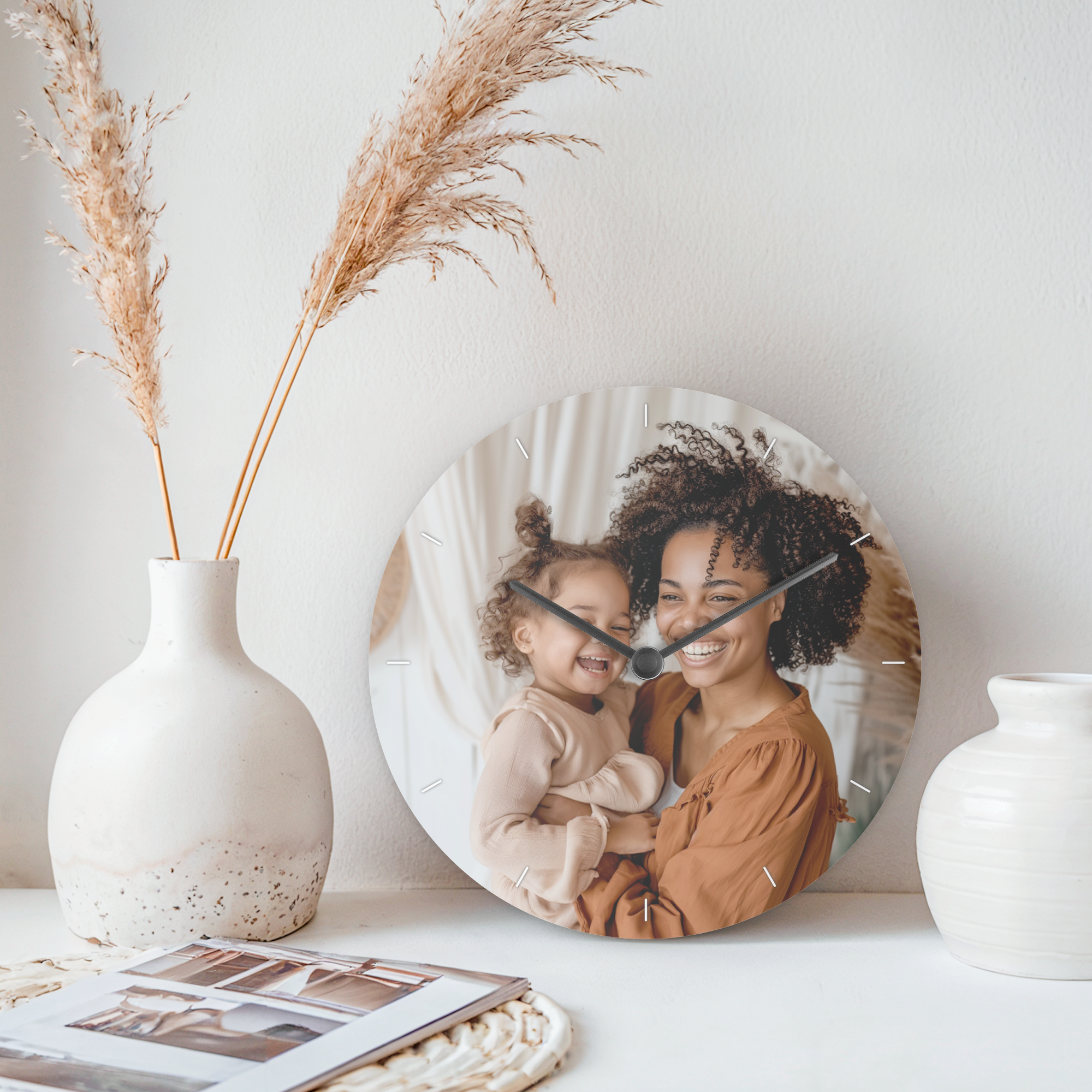 Round personalized photo clock with a picture of a smiling mother and daughter printed on the face