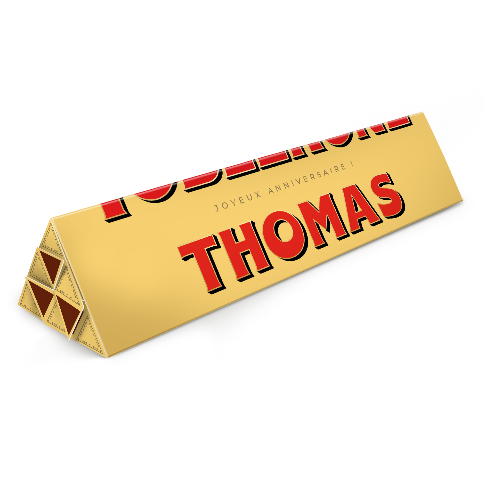 Toblerone personnalisé - 3600 g, avec le texte Joyeux Anniversaire et le prénom THOMAS imprimés en rouge sur l'emballage doré.