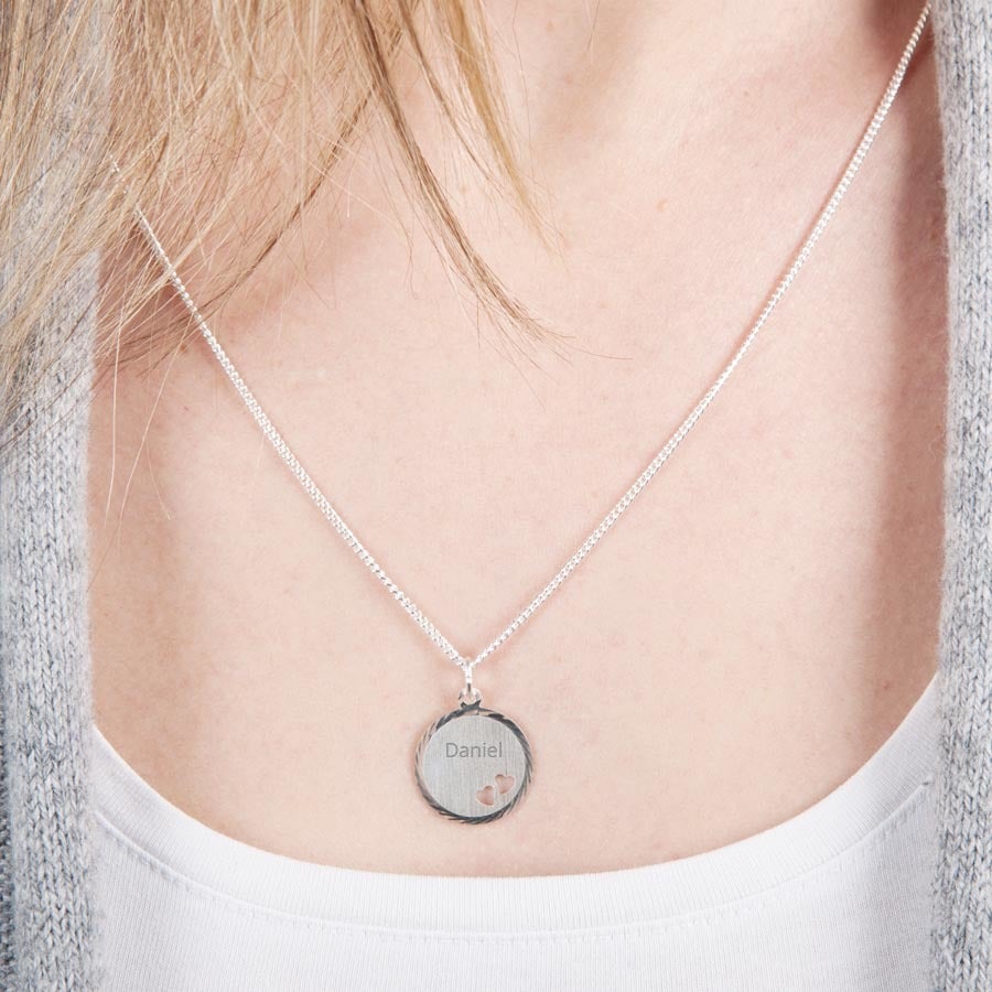 Engraved silver pendant with hearts Engraved silver pendant with hearts