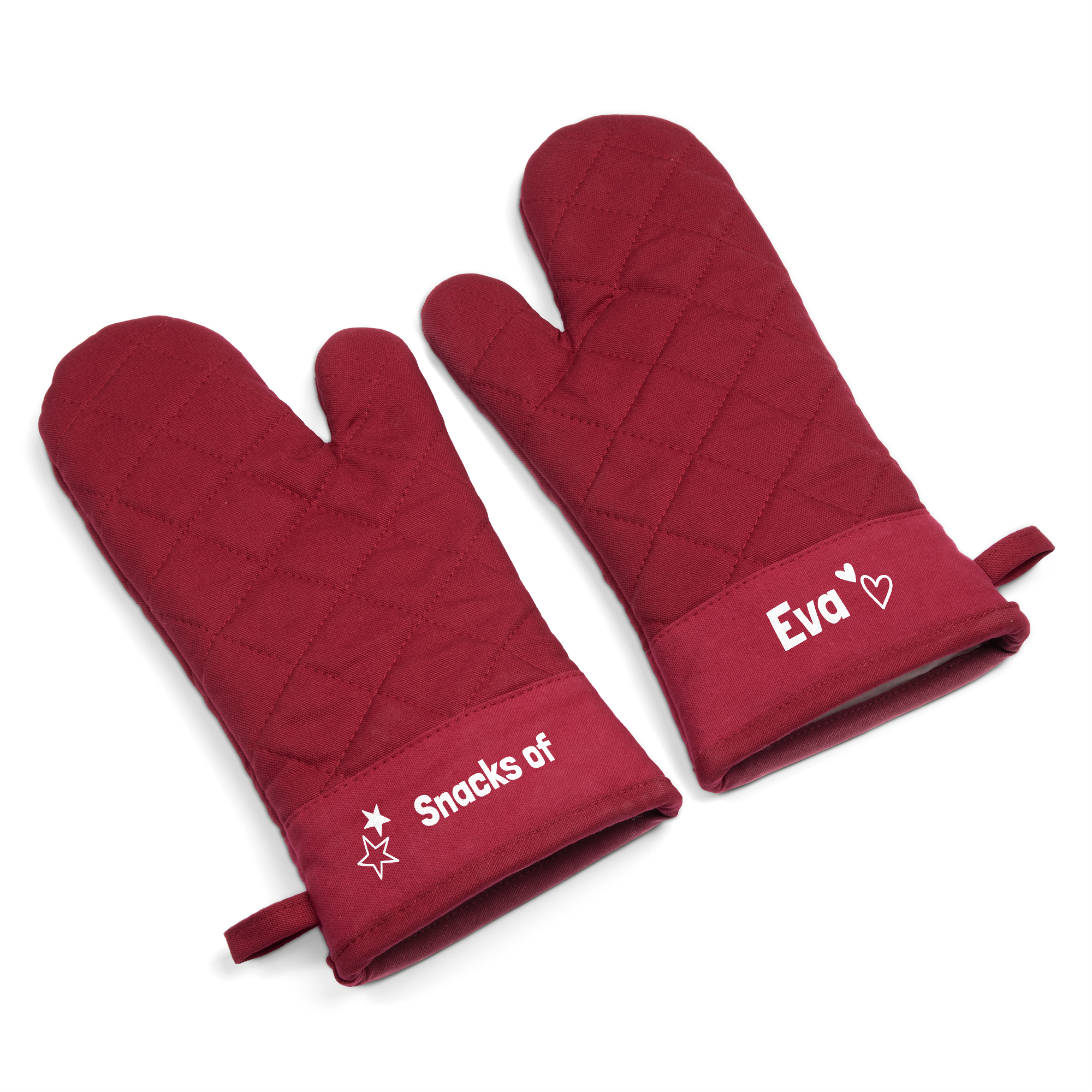 A set of red personalized oven gloves. One glove is printed with the name Eva and a heart, the other with Snacks of and a star. Cook up a storm with these unique oven gloves.