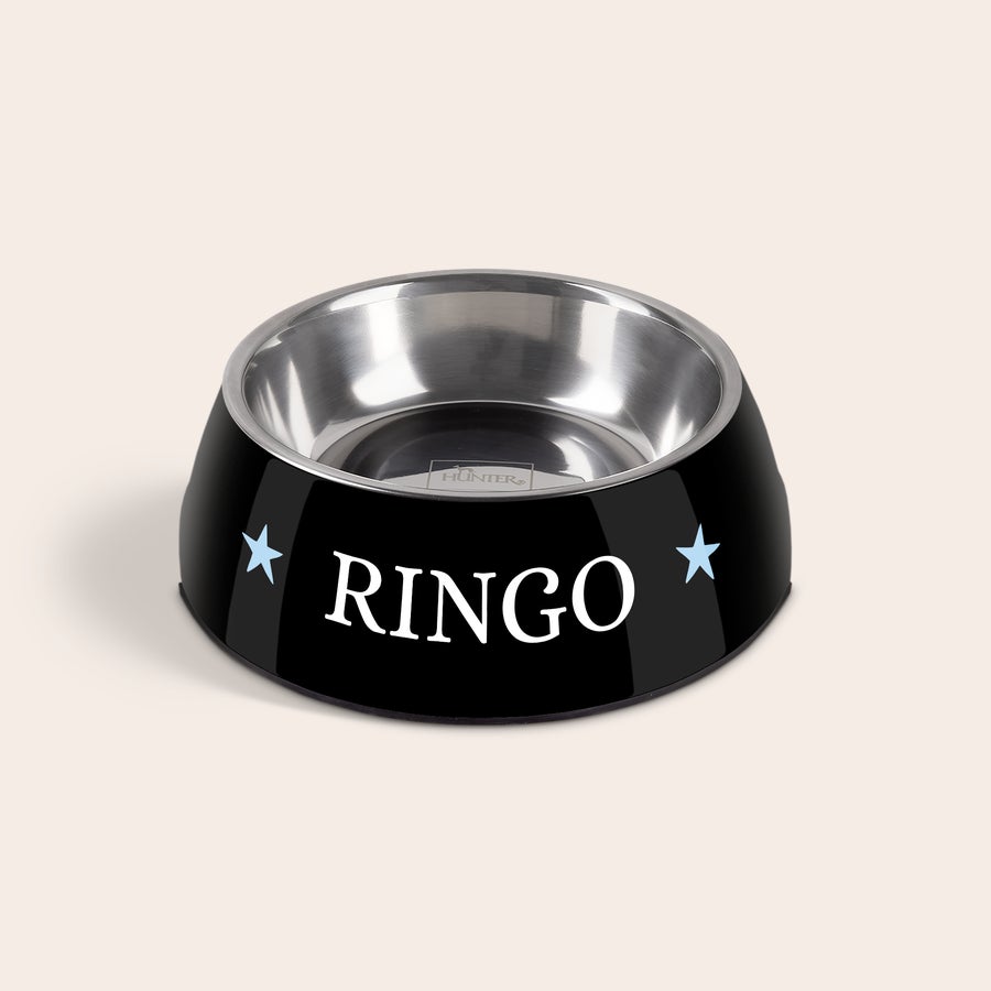 Hundefôrskål Svart hundeskål i melamin og stål med navnet RINGO og to lyseblå stjerner.