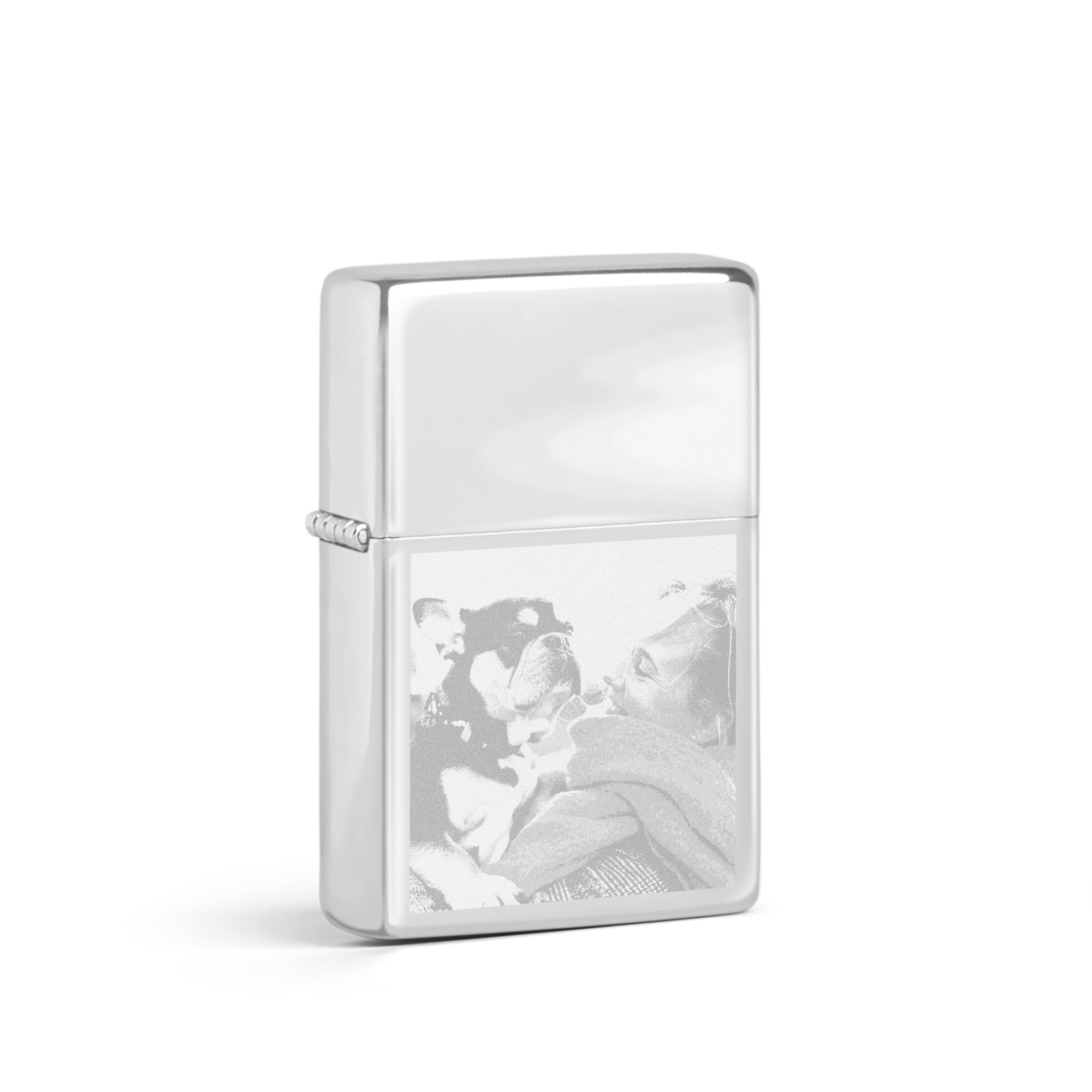 Silver engraved photo lighter with a photo of a person cuddling a dog, transforming memories into a flame of elegance.
