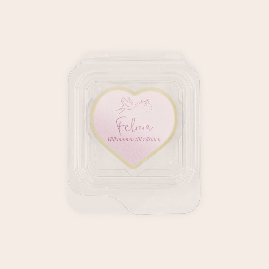 Choklad med tryck - individuellt förpackade Hjärtformad vit chokladpralin med tryckt foto och texten Felicia, Välkommen till världen och en stork med baby.