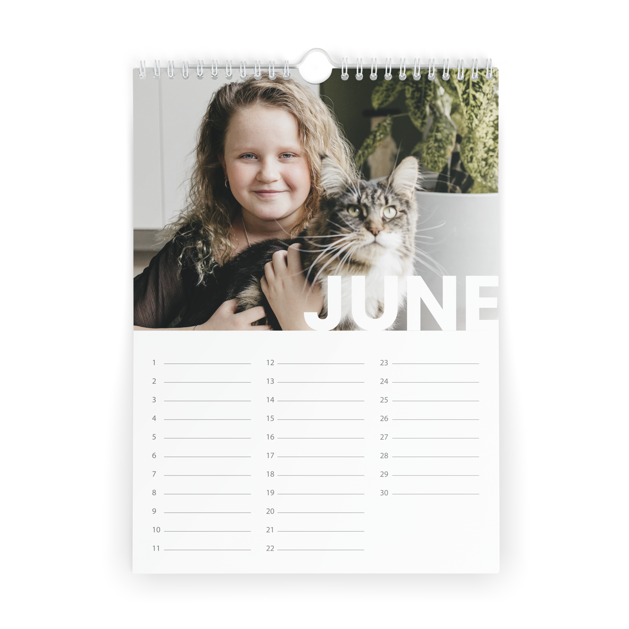 Personalised birthday calendar printed with a photo of a girl and a cat for June