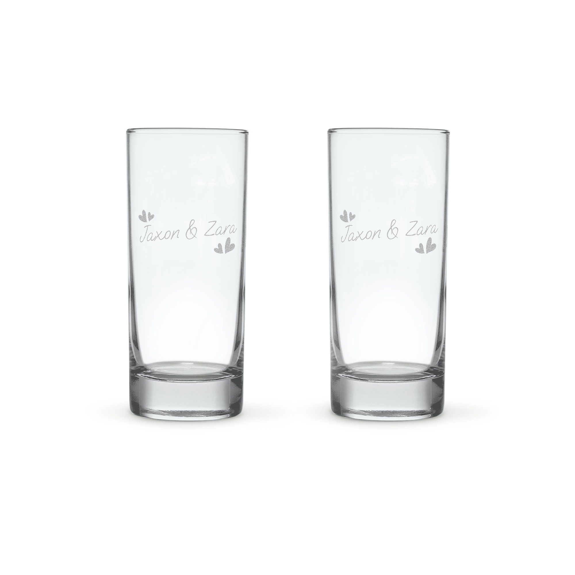 Two personalized highball glasses engraved with Jaxon & Zara and small hearts