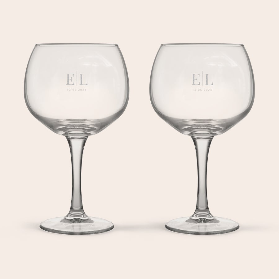 Personalised Gin & Tonic Glasses Two personalised Gin & Tonic glasses, engraved with initials EL and the date 12.06.2024.