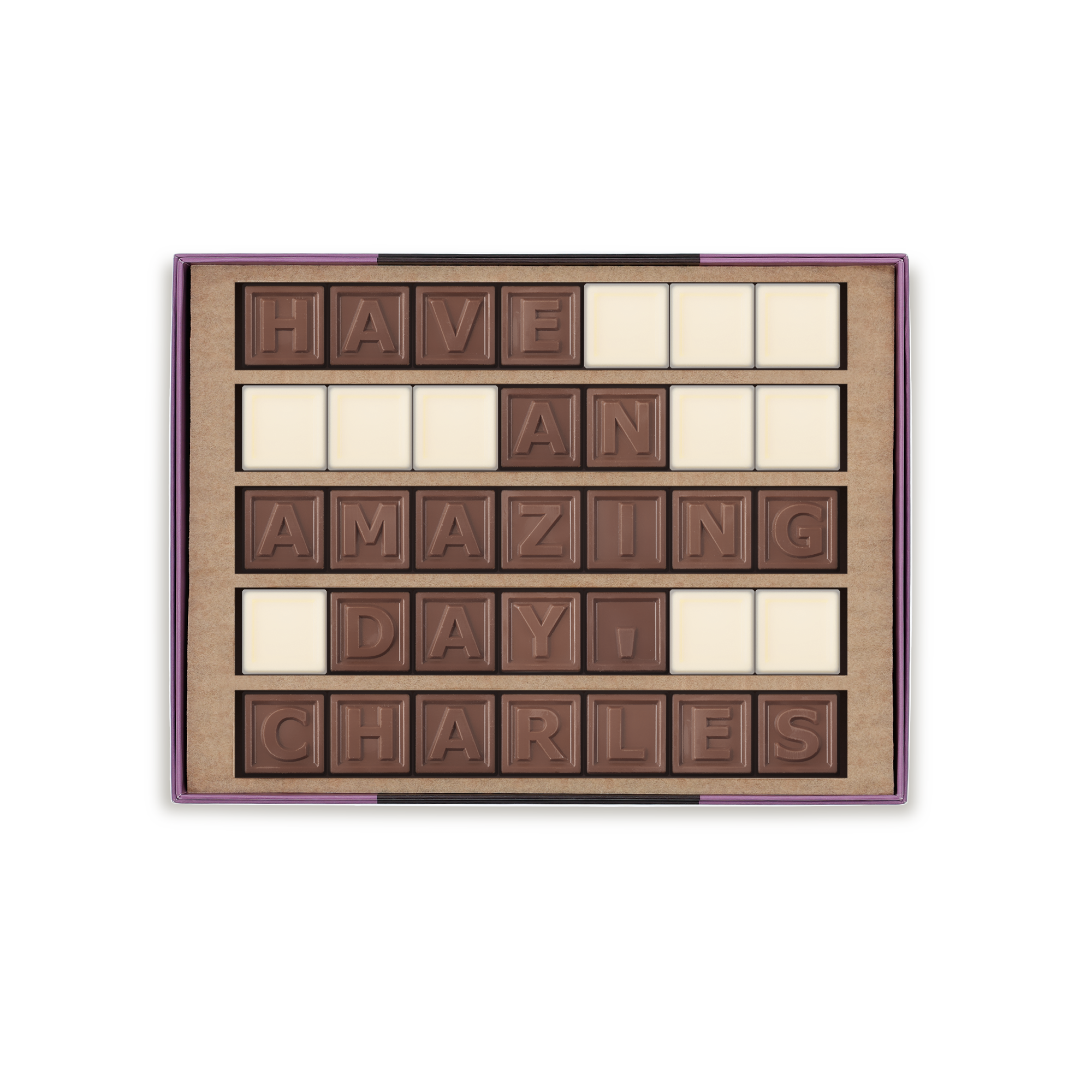 Dit personlige chokoladetelegram med "HAVE AN AMAZING DAY CHARLES" formet af mælke- og hvid chokolade