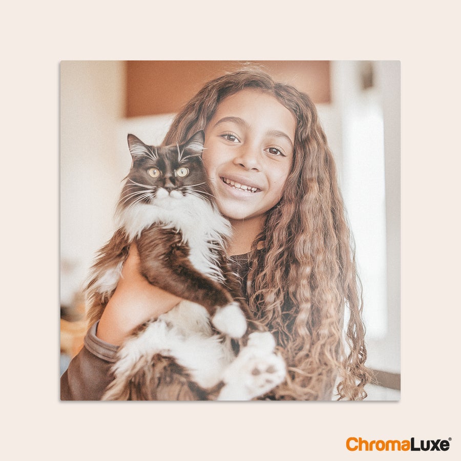 Aluminium photo panel Chromaluxe aluminium photo print showing a girl holding a black and white cat, perfect for your favorite memories