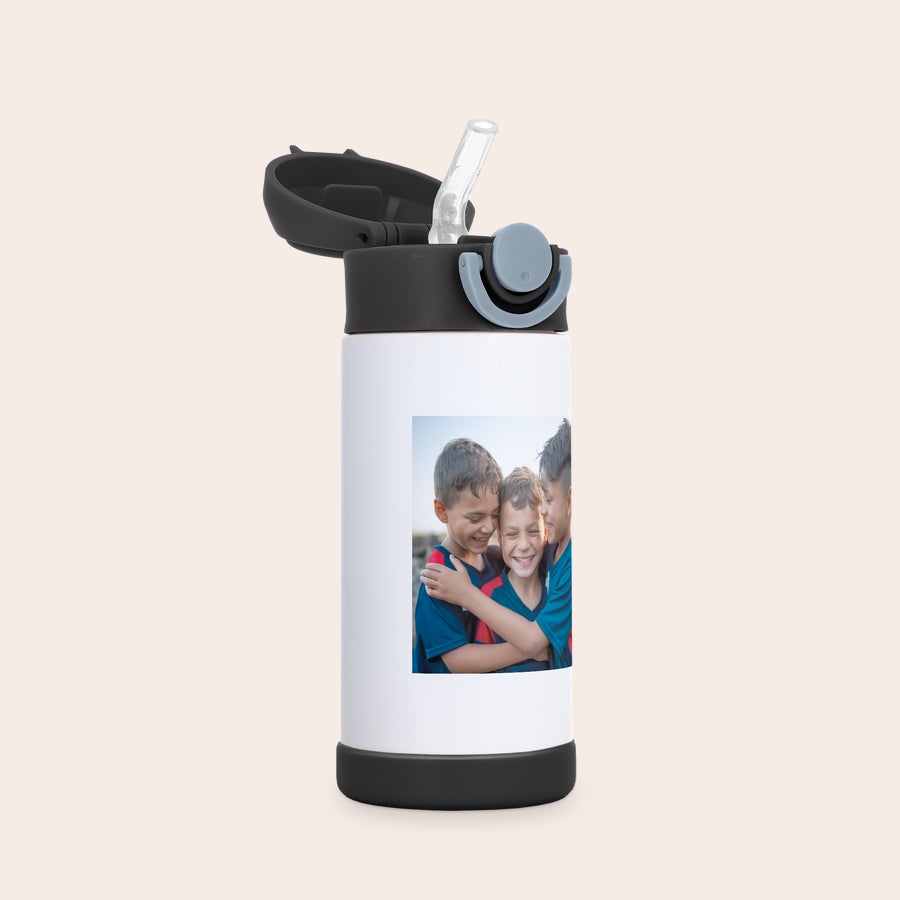 Kids water bottle with photo White custom kids stainless steel water bottle with straw, printed with a photo of three boys embracing. Make Every Sip Special with a Custom Kids Stainless Steel Water Bottle.