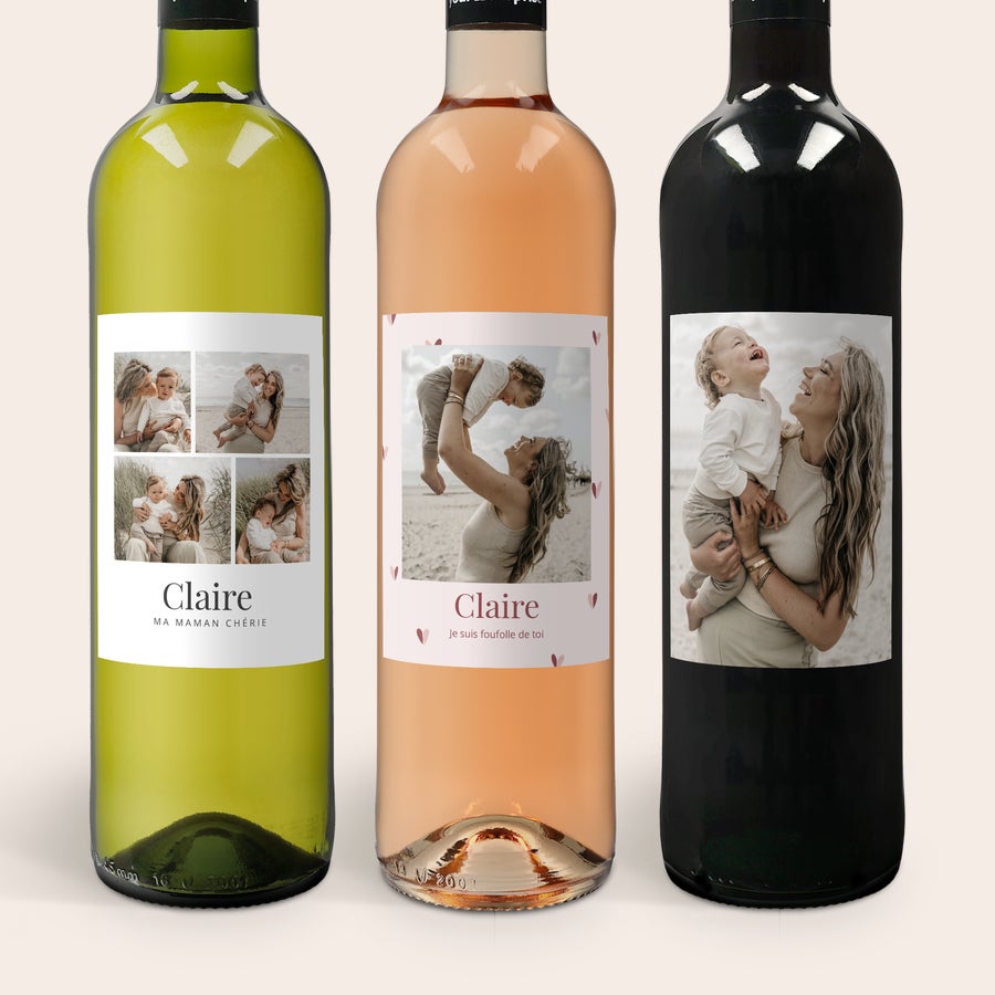 Coffret vin Maison de la Surprise personnalisé Trois bouteilles de vin Maison de la Surprise avec étiquettes personnalisées : blanc, rosé, rouge, chacune avec des photos et textes Claire