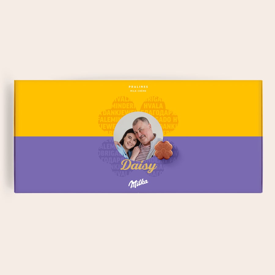 Praline Milka Vă mulțumim O cutie cadou personalizată Say it with Milka, galben-violet, cu o fotografie imprimată, numele "Daisy" și un mesaj de mulțumire.