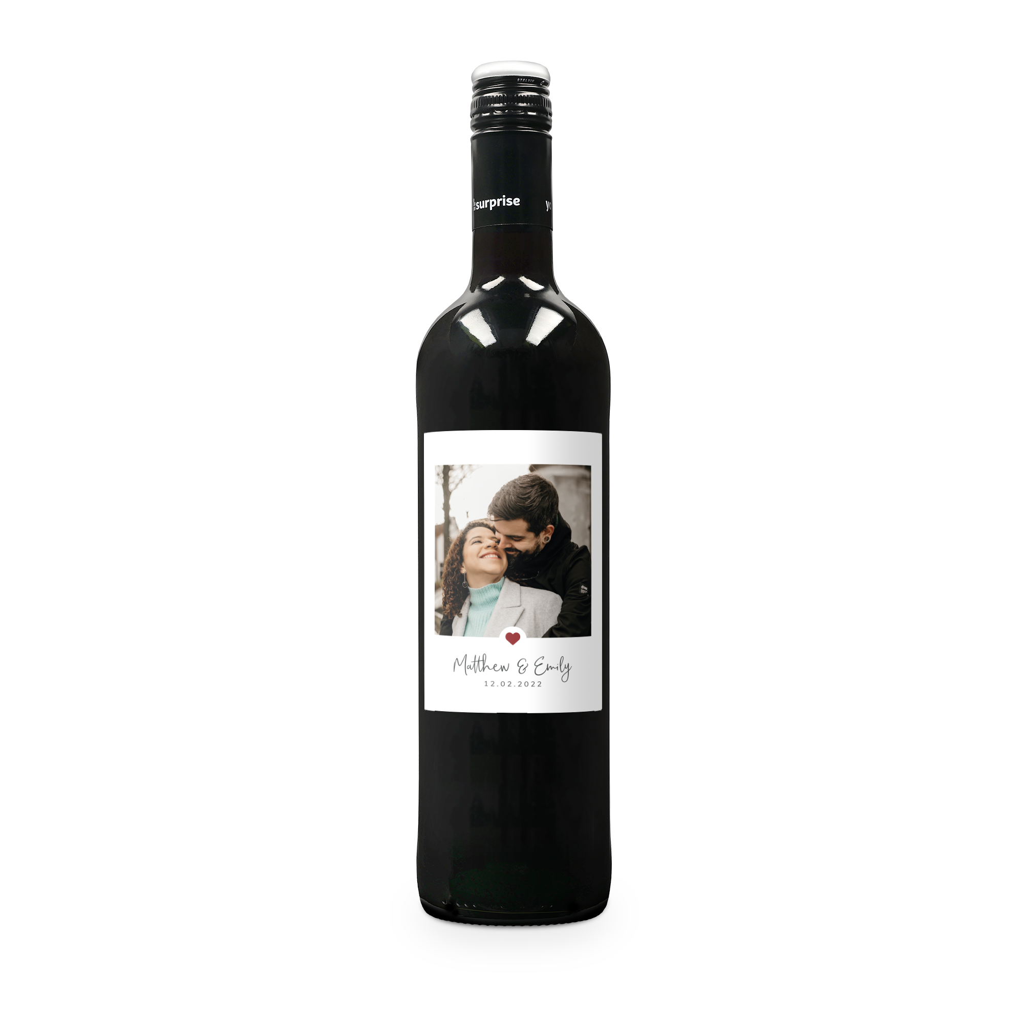A bottle of Maison de la Surprise Merlot with a personalized label, printed with a photo of a couple and the text Matthew & Emily 12.02.2022 to surprise your loved ones.