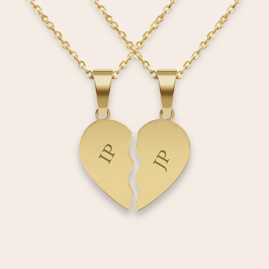 Collana con cuore spezzato inciso Collana con cuore spezzato inciso