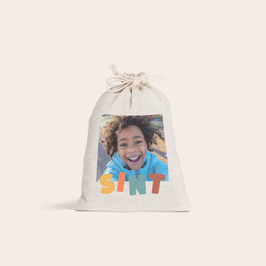 Pepernoten zakje bedrukken Gepersonaliseerd katoenen Sinterklaas zakje bedrukt met een vrolijke foto van een kind en de tekst SINT.