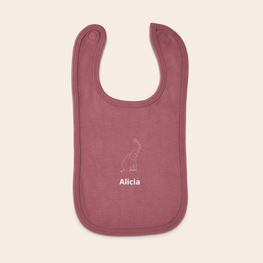 Bavoir personnalisé Bavoir personnalisé rose avec un éléphant et le nom Alicia. Plus d'inquiétude, ses vêtements resteront propres !