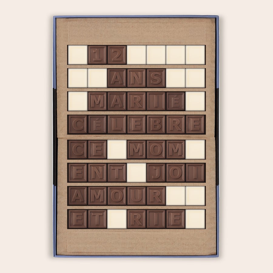 Messages en chocolat - Chocotelegram Chocotelegram® personnalisé avec le message 12 ans Marie célèbre ce moment de joie et de rire, dans son coffret cadeau