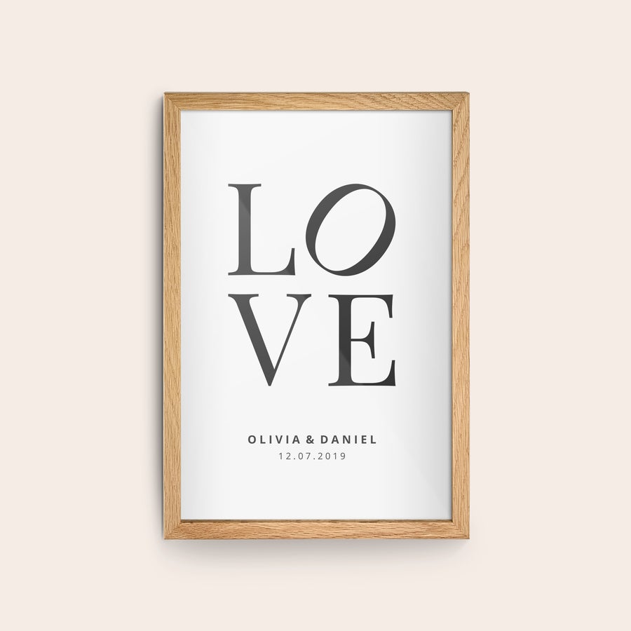 Personalised photo print with frame Personalized photo print with a wooden frame displaying "LOVE" and custom names and a date