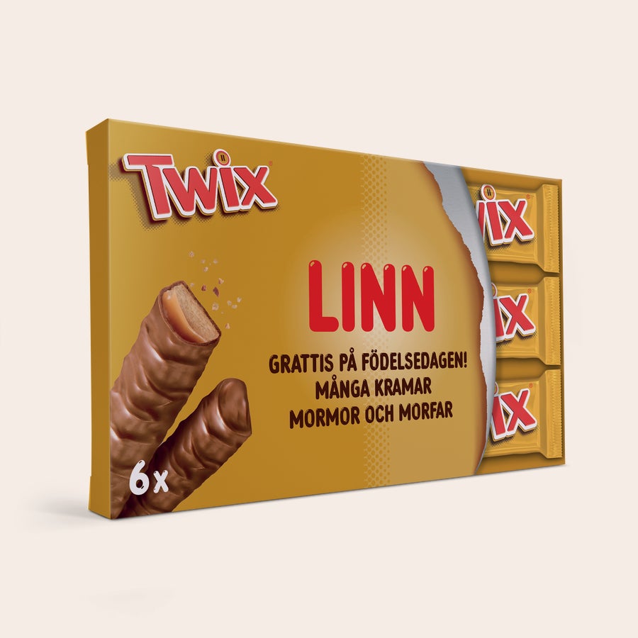 Personlig Twix chokladkaka En personlig Twix-presentask med namnet LINN och gratulationsmeddelande tryckt i rött, med 6 Twix-bitar inuti.