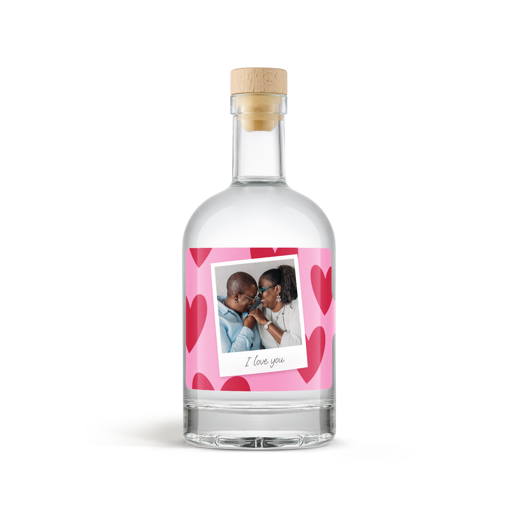 Fles gin met gepersonaliseerd etiket met foto van een koppel, hartjes en de tekst 'I love you'.