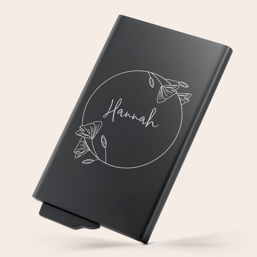 Portofel personalizat slide - Metal Portofel slide metalic personalizat cu gravură laser, cu numele Hannah și model floral.