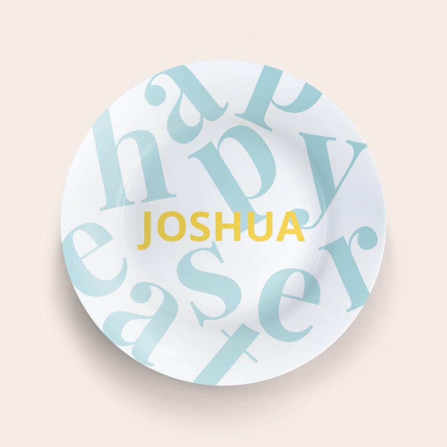 Teller bedrucken - Ostern Ein personalisierter Osterteller bedruckt mit dem Namen Joshua und hellblauen Happy Easter Buchstaben
