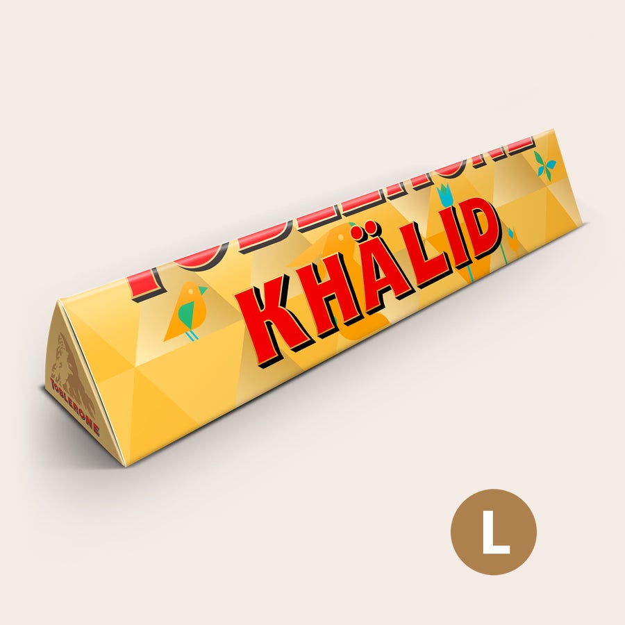 Personlig Toblerone - Påske Personlig påske-Toblerone-sjokolade med navnet KHALID, trykt med påsketema og fugler.