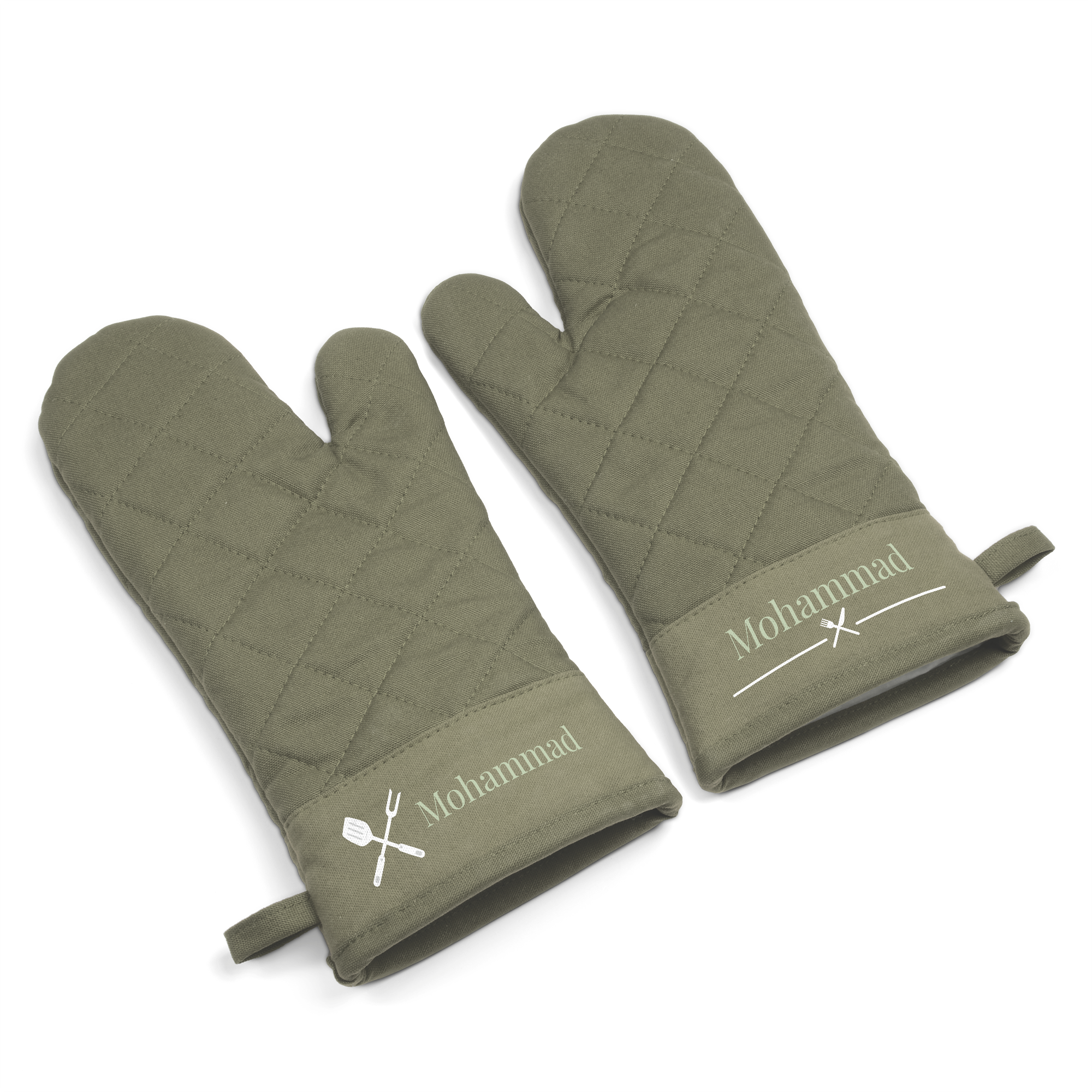 A set of personalized oven gloves in a soft green color printed with the name Mohammad and cooking utensils