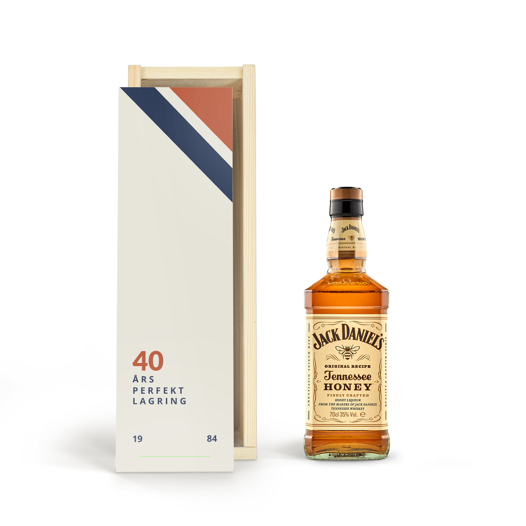 En personaliseret trykt etui med Jack Daniel's Honey whisky og et rødt, hvidt og blåt flagtryk med teksten 40 ÅRS PERFEKT LAGRING 1984.